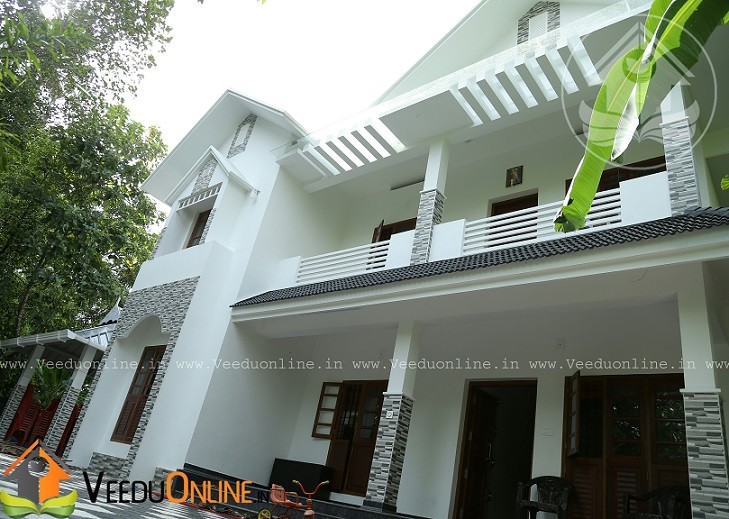 2240 Square Feet Double Floor Traditional White Home Design