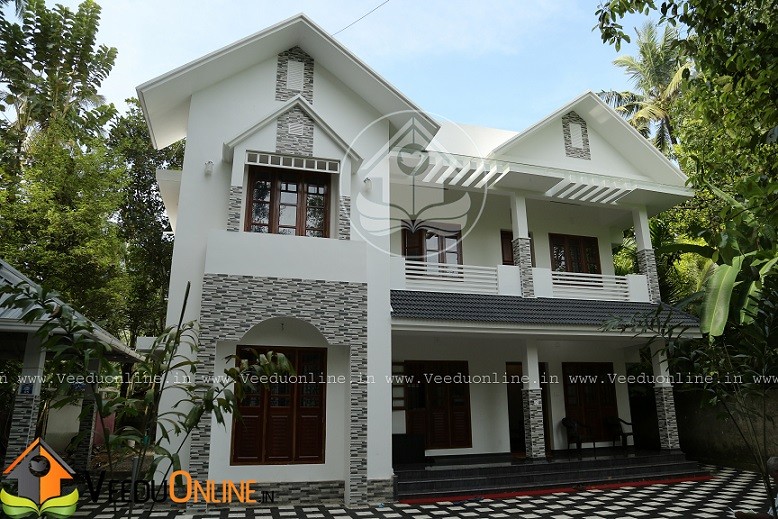 2240 Square Feet Double Floor Traditional White Home Design
