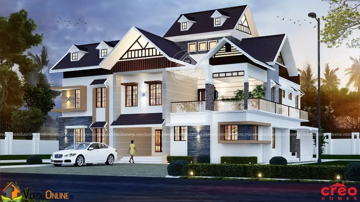 5 bedroom luxury house 4447 sq ft grand colonial style Kerala villa with dormers