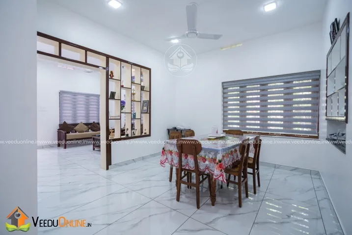 Dining area with wooden shelf partition