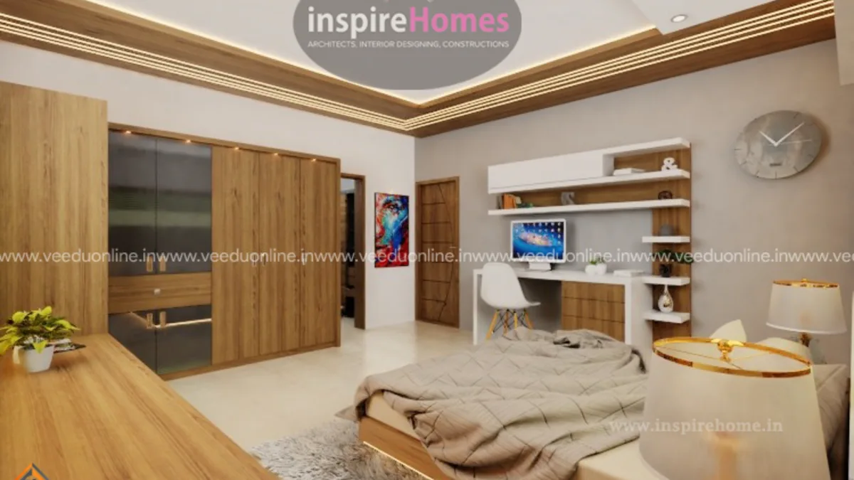 Budget bedroom interior design Kerala with wood finish wardrobe and study table