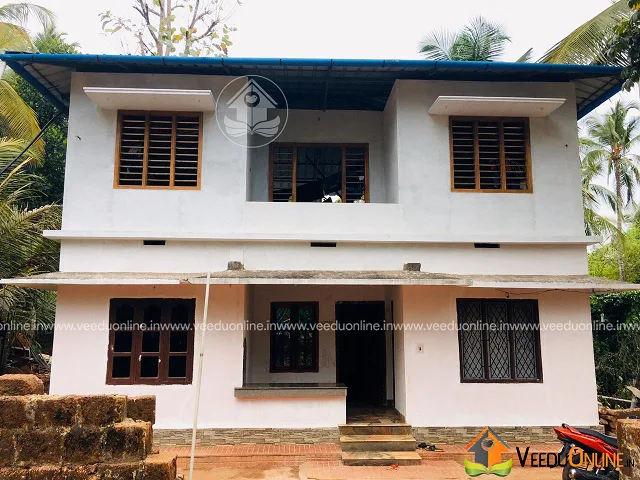 Front view of the old two storey house before renovation