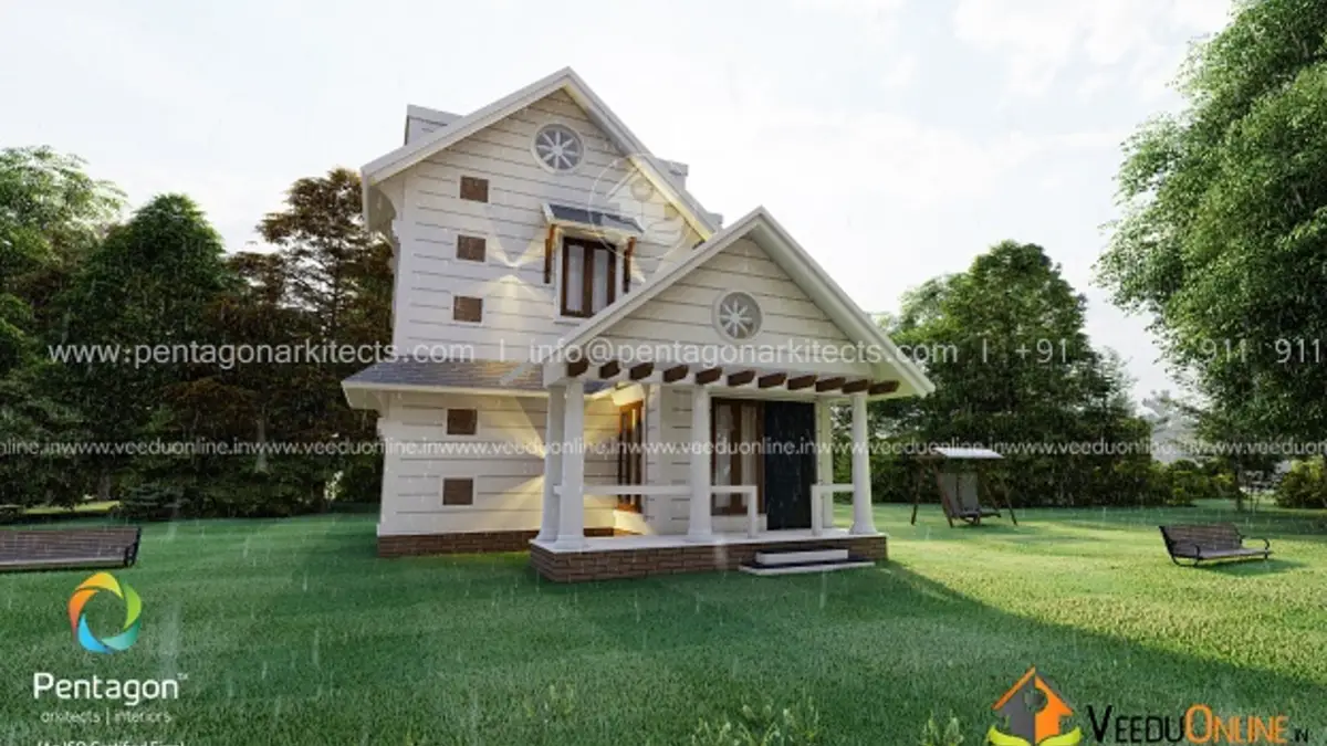 Cottage style house Kerala 885 sq ft with steep gable roofs and lawn