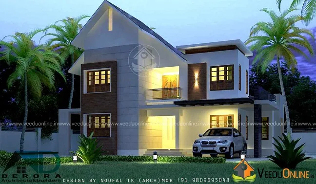 Side view of Kerala house with car porch at night
