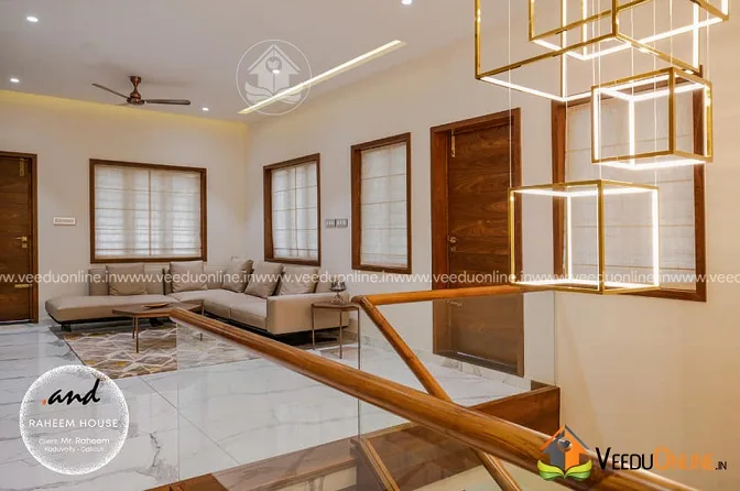 Upper living area with geometric chandelier