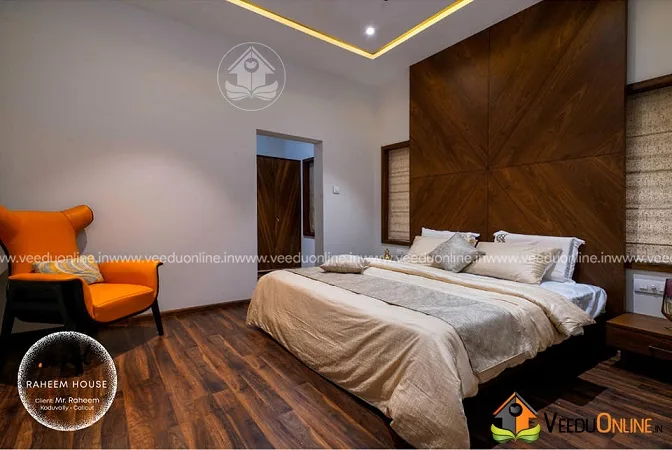 Master bedroom with wooden panel headboard