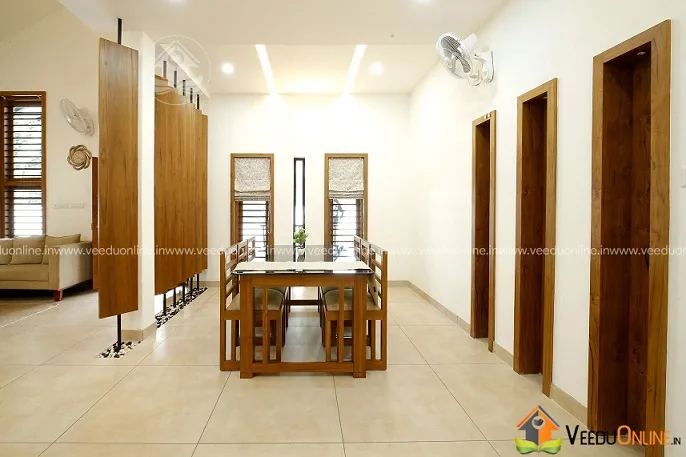Dining area with wooden table and corridor