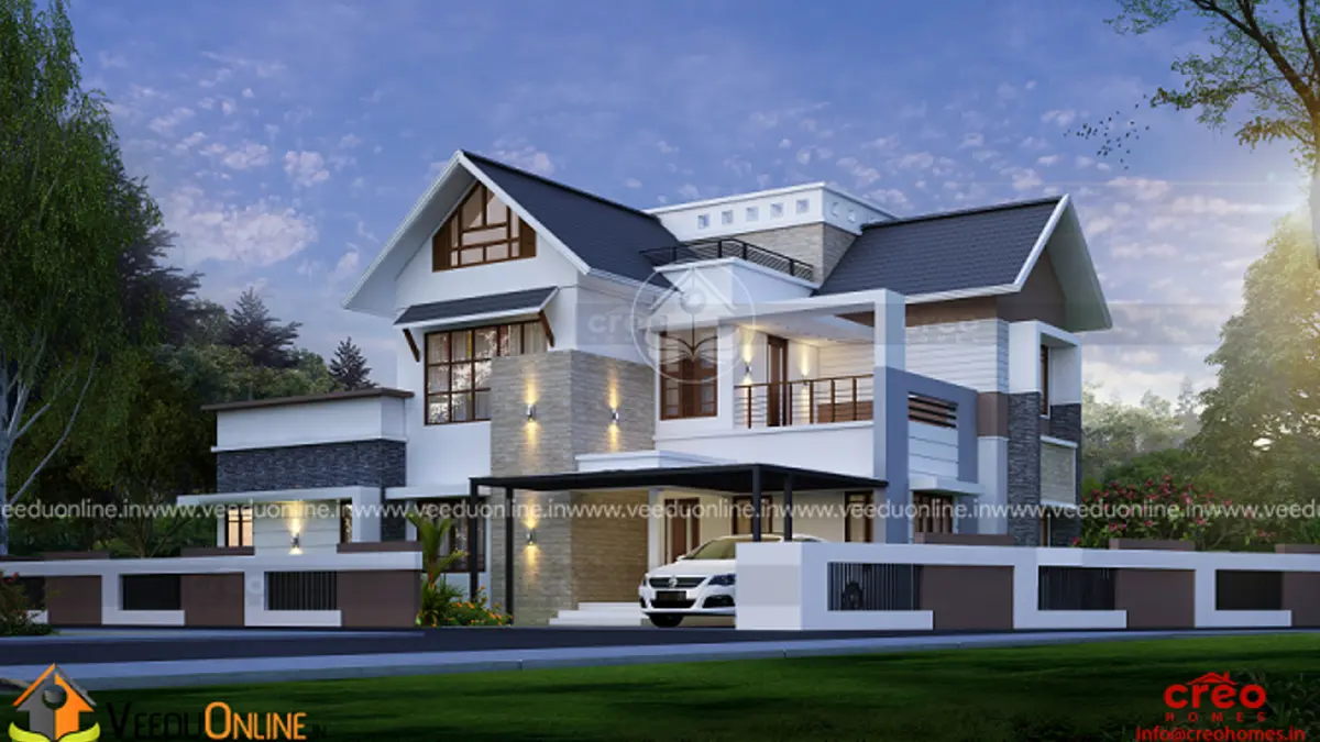 Kerala house with study area 2543 sq ft modern double floor home at dusk