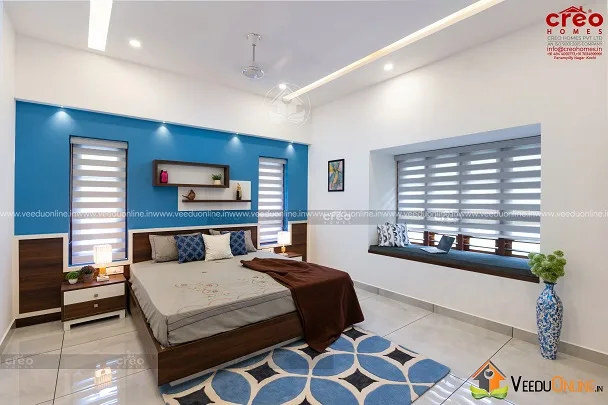 Bedroom with blue accent wall