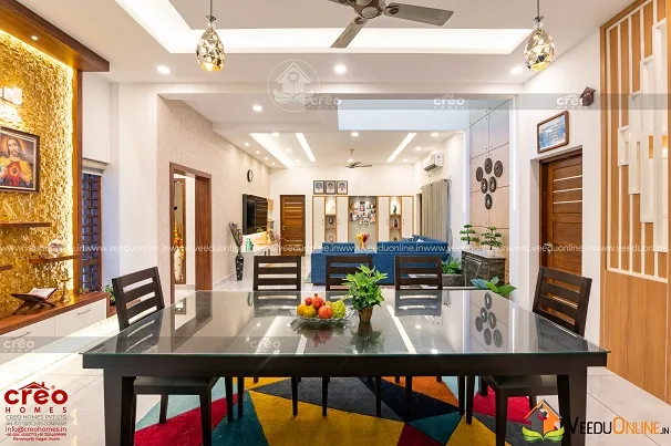 Open dining and living with wooden screens