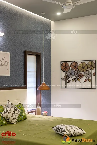 Bedroom corner with wall art