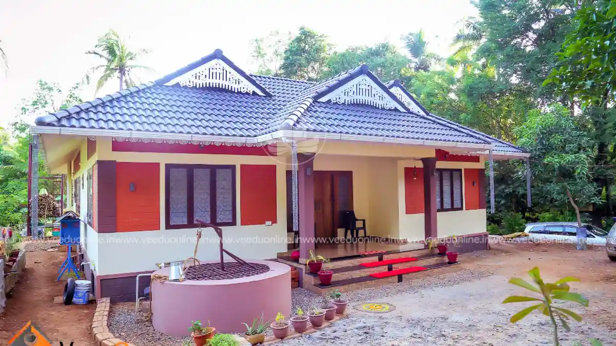 Naalukettu house plan 1673 sq ft traditional Kerala home with tiled roof