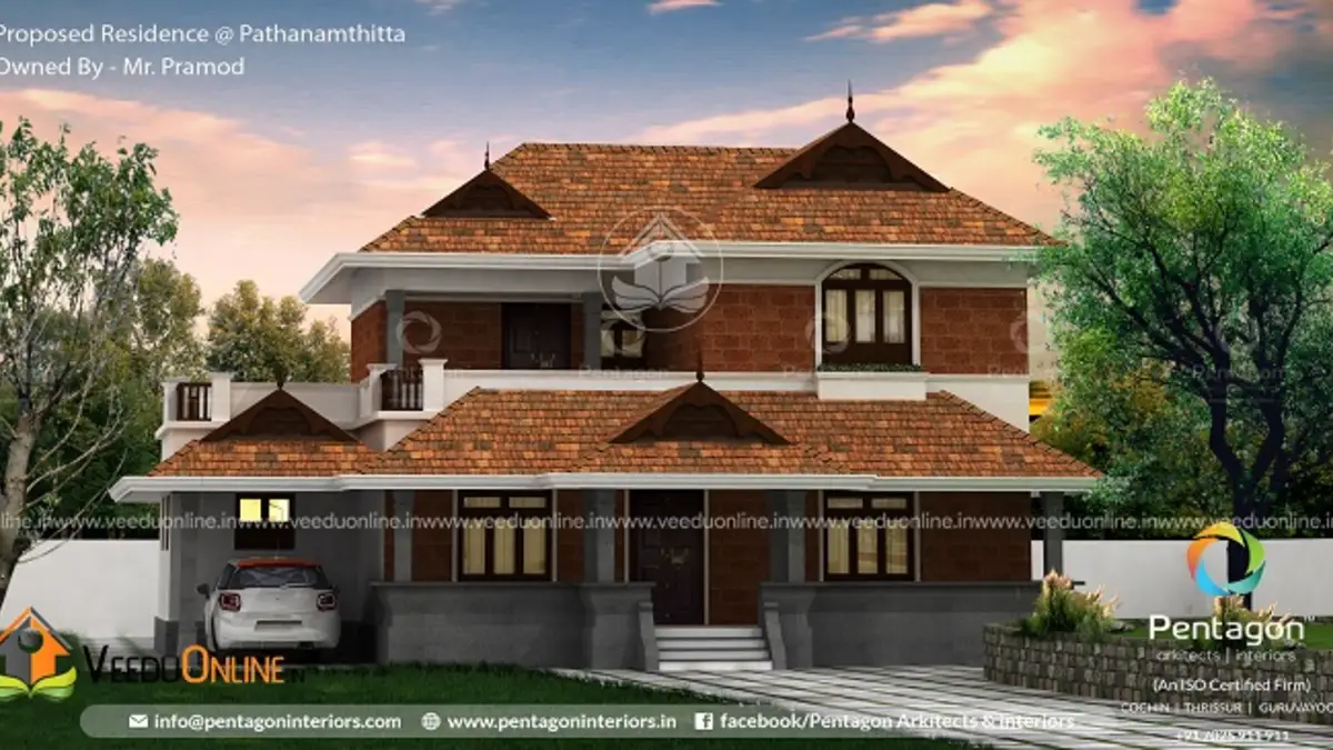 Nalukettu style house 2692 sq ft traditional Kerala home with tiered tiled roofs