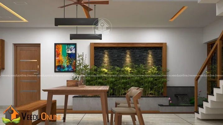 Dining area with wall art near staircase