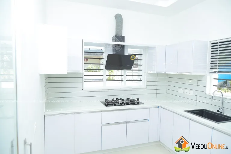 White modular kitchen with chimney
