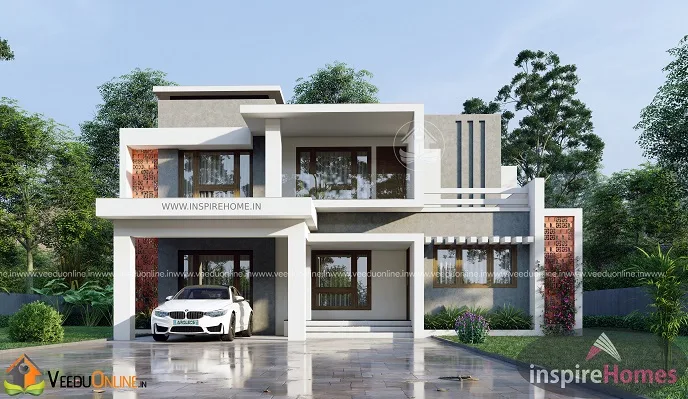 Front elevation of white contemporary Kerala house with flat roofs